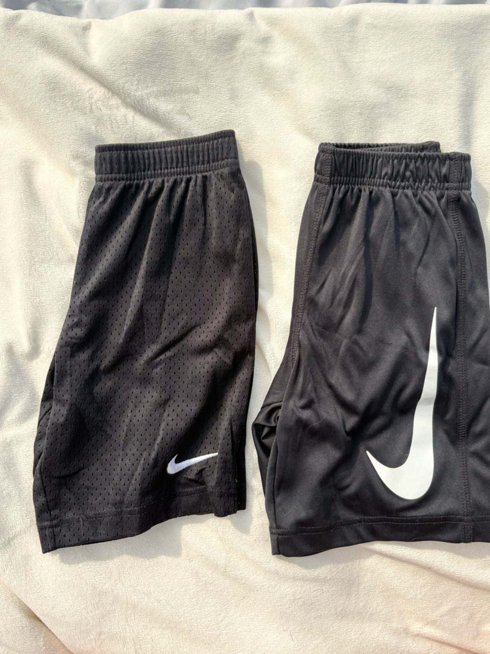 Nike Black Kids size 7 shorts with White Swoosh